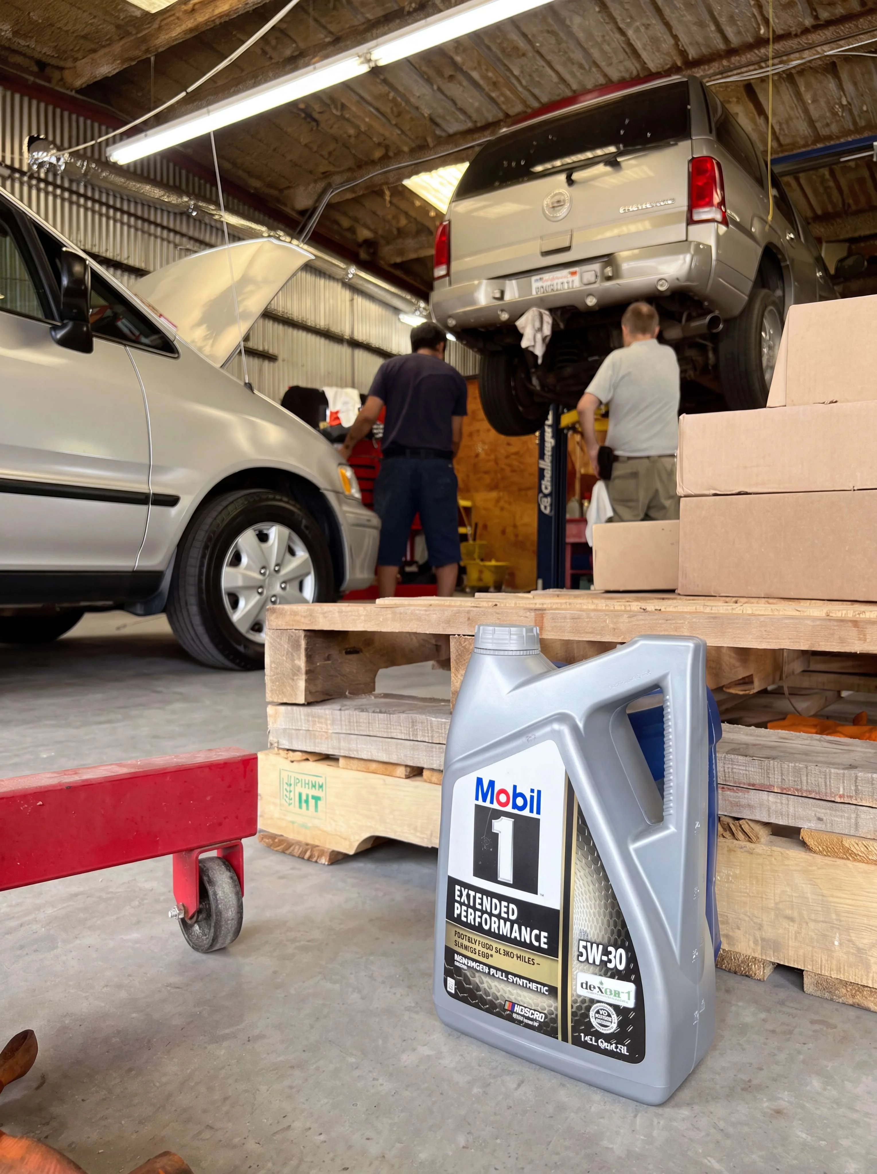 Shop floor with oil and service in progress at I Care Automotive